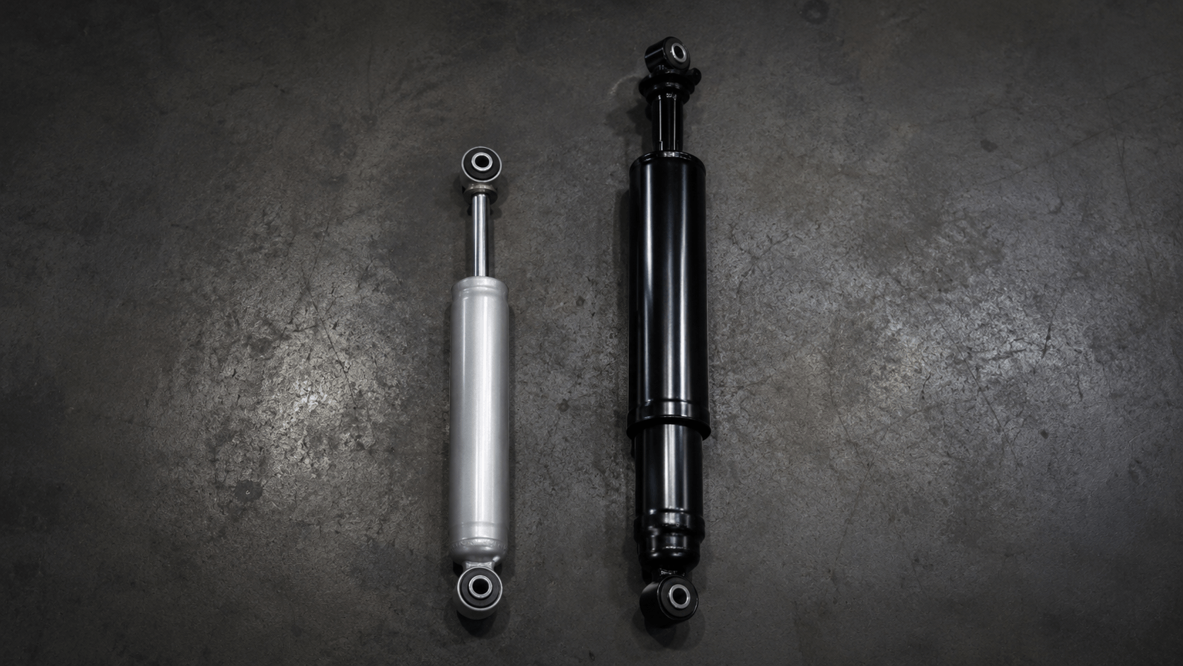 lift shocks vs stock shocks side by side